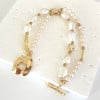 Baroque cultured pearl bracelet 2 rows gold plate T clasp
