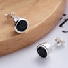 Silver round stud earrings for men and women with black zirconium