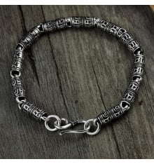 Men's silver cylindrical oxide bracelet with OM motif