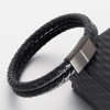 Pulsera de hombre con cordones de cuero doble trenzado y cierre magnético.