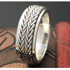 Anillo hombre antiestrés trenza giratoria plata