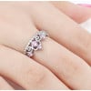 Rhodium silver ring with pink zirconium crown