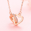 Colgante collar doble corazón en plata rodiada y circonita