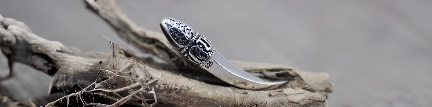 pendentif argent dent canine motif celtique