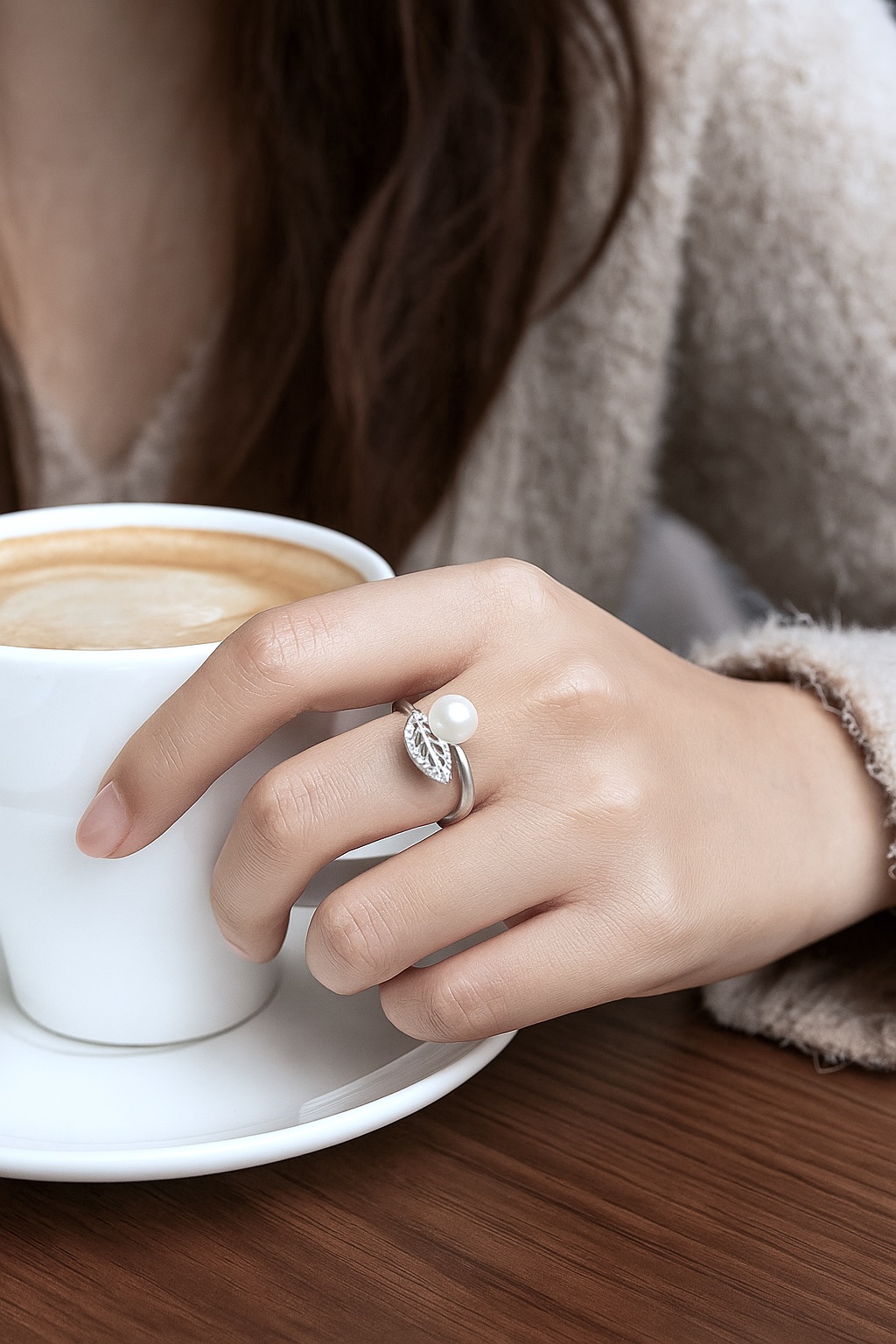 Sterling silver ring with freshwater pearl and leaf design