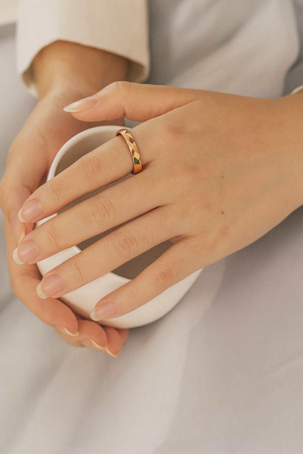 Personalized tungsten faceted wedding band with gold plating