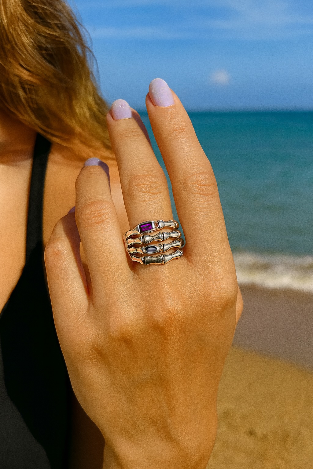 Silver skeleton hand ring