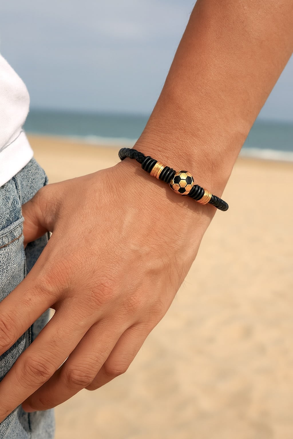 Men’s black braided leather bracelet with stainless steel football charm
