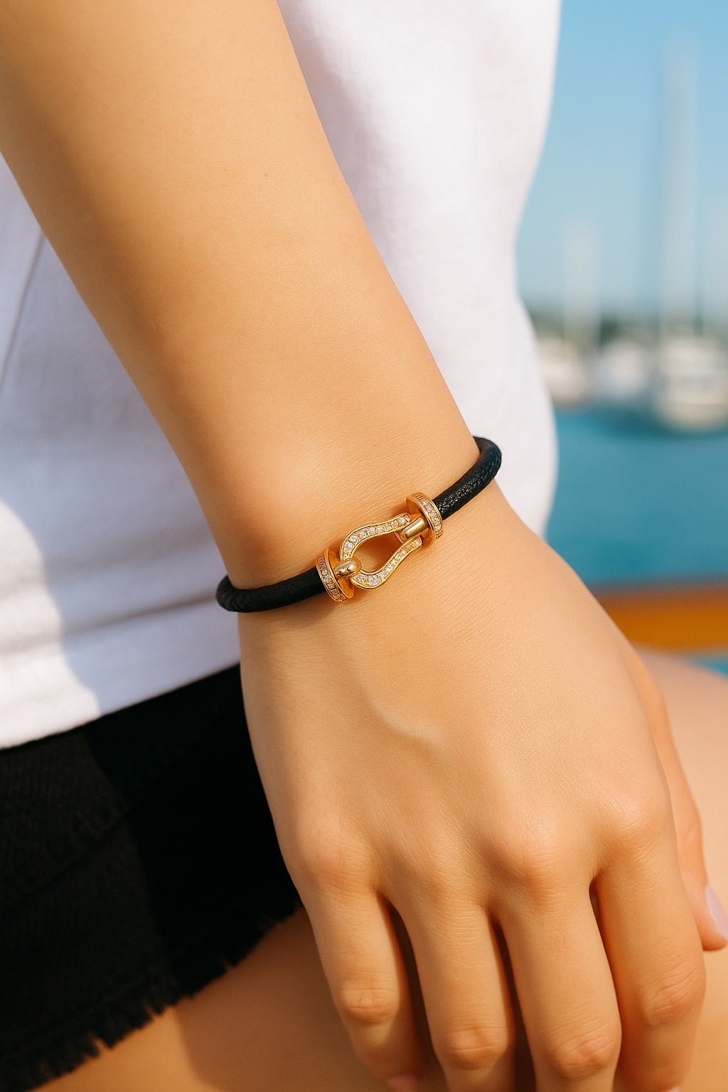 bracciale in pelle intrecciata con chiusura a grillo marino