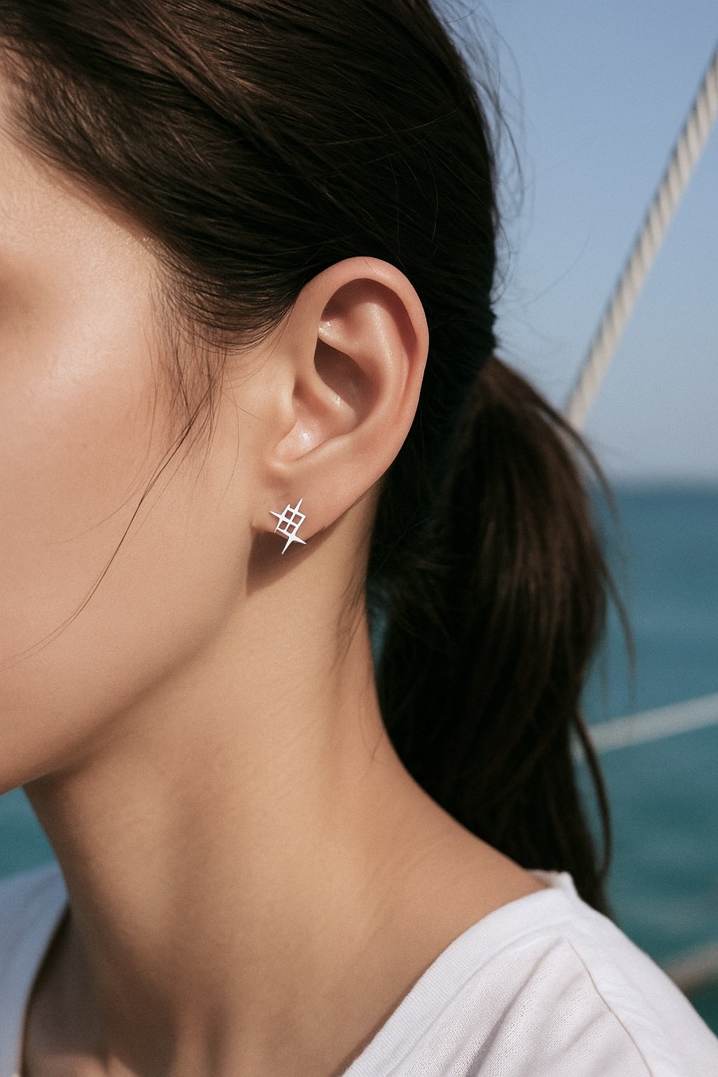 Orecchini a bottone con stelle in argento per donna